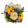 Produktbild på bukett med gula blommor ovanifrån